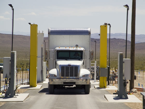 A truck drives through a Portal Monitor Test Area in Nevada. Developing better sensors to identify radiological or nuclear material that could be used as nuclear or dirty bombs, is an engineering challenge. 